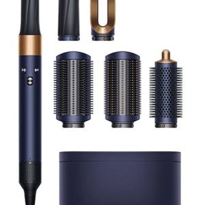 Dyson air wrap. Pretty much brand new. Only tried like 2 times.